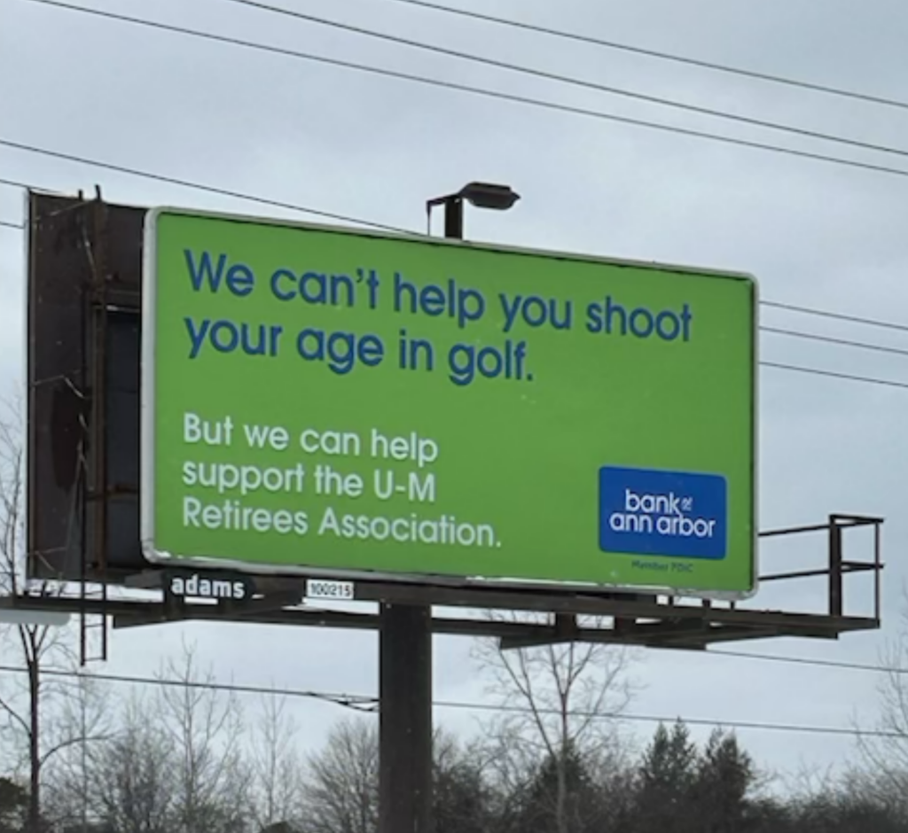 Billboard of Bank of Ann Arbor promoting the University of Michigan Retirees Association.